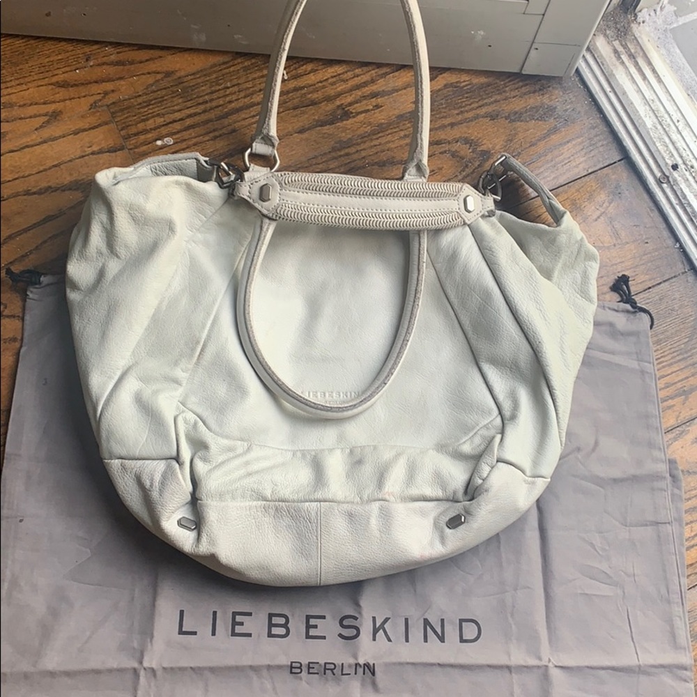 Gently used light gray leather bag